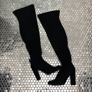 Black thigh-high booties